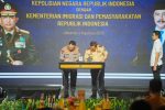 Kapolri Jenderal Listyo Sigit Prabowo menandatangani nota kesepahaman (MoU) dengan Menteri Imigrasi dan Pemasyarakatan (Imipas) Agus Andrianto di Hotel Shangri-La, Jakarta, Senin (4/8/2025).